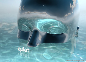 the humongous silver head is in the ground. the tiny "quiet" is 1 foot in front of the head. the tiny "quiet" is on the ground. it is partly cloudy. the ground is shiny water.