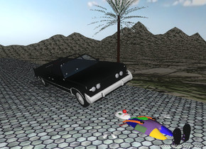 The leaning  car is on the wide tile driveway.  the driveway is 200 feet long. The driveway is on the tall mountain range. the mountain range has a grass texture.

It is partly cloudy.

The tiny palm tree is to the right of the car.  The face-up clown is in the driveway.  The clown is in front of the car.