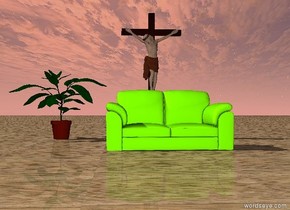 the chartreuse couch is several feet in front of the jesus. The jesus is behind the chartreuse couch. the ground is wood.  the huge potted plant is 1  feet to the left of the jesus