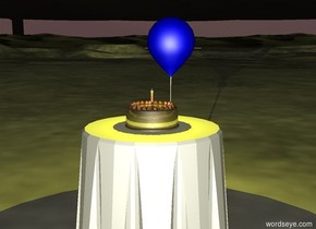 it is evening. there is a table. there is a gold cake on the table. there is a small candle on the cake. there is a balloon to the right of the table. the balloon is 2 feet above the ground. there is a yellow light above the cake