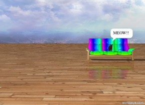The cat is on a couch.
The couch is Rainbow.
There is a wood ground.


