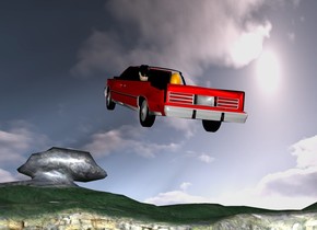 the ground. a  red car is 35 feet above the ground. it leans back. 1st tan head is -3.8 feet above and -7 feet behind and -1.4 feet right of the car. 2nd orange head is  1.3 feet left of the 1st head. the hair of the 1st head is black.