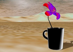 A flower is inside a mug.