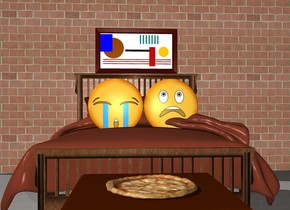 There is a bed on the ground. There are 2 emojis on top of the bed. There is a long tall brick wall behind the bed. There is a painting on the wall above the bed. There is a table in front of the bed. There is a pizza on the table.