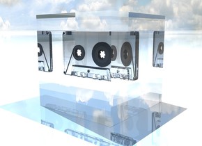 glass cube on the  shiny ground.
the glass cassette fits in the cube. 
the cassette is 4 inches above the ground.
a light is 1 foot above the cube.
the ground is sky