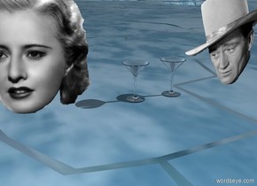 huge glass 1 
feet to right of huge head and one huge glass 2 feet to the left of huge head. 
