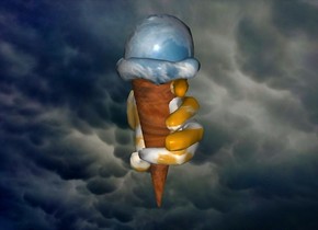 a [mc] backdrop.a 100 inch tall  wood ice cream cone.the ice cream of the ice cream cone is 20% dim cloud.a 80 inch tall orange [wc]  hand is -80 inch above the ice cream cone.the hand leans 90 degrees to left.